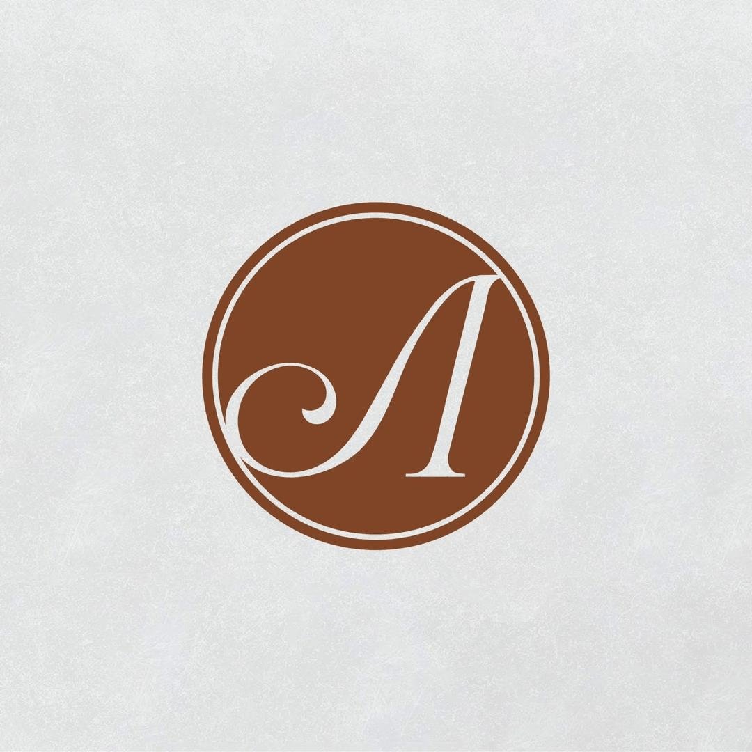 Brown circular A monogram